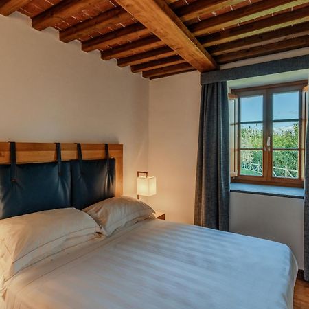 פירנצה Villa Tolomei Hotel & Resort מראה חיצוני תמונה A room at the hotel