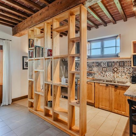 פירנצה Villa Tolomei Hotel & Resort מראה חיצוני תמונה A room divider in a kitchen