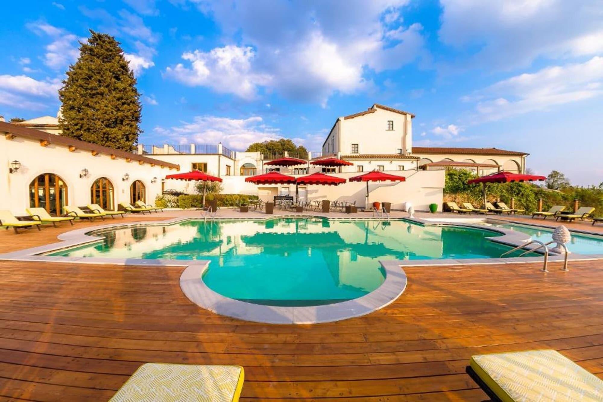 פירנצה Villa Tolomei Hotel & Resort מראה חיצוני תמונה The swimming pool at the hotel