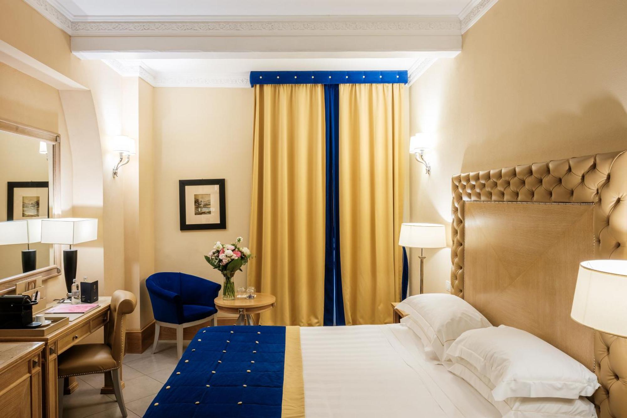 פירנצה Villa Tolomei Hotel & Resort מראה חיצוני תמונה A room at the hotel