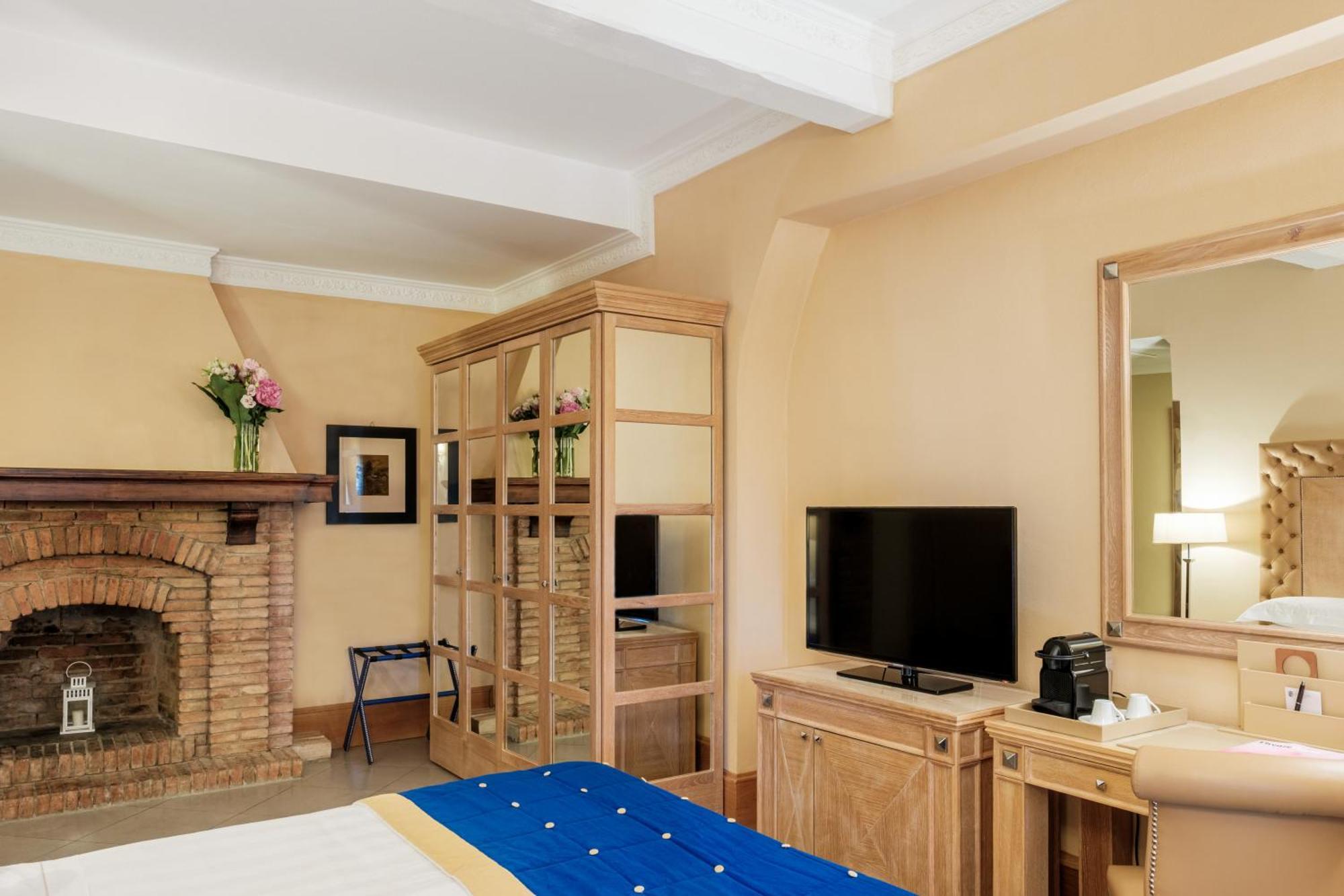 פירנצה Villa Tolomei Hotel & Resort מראה חיצוני תמונה A bedroom at the hotel