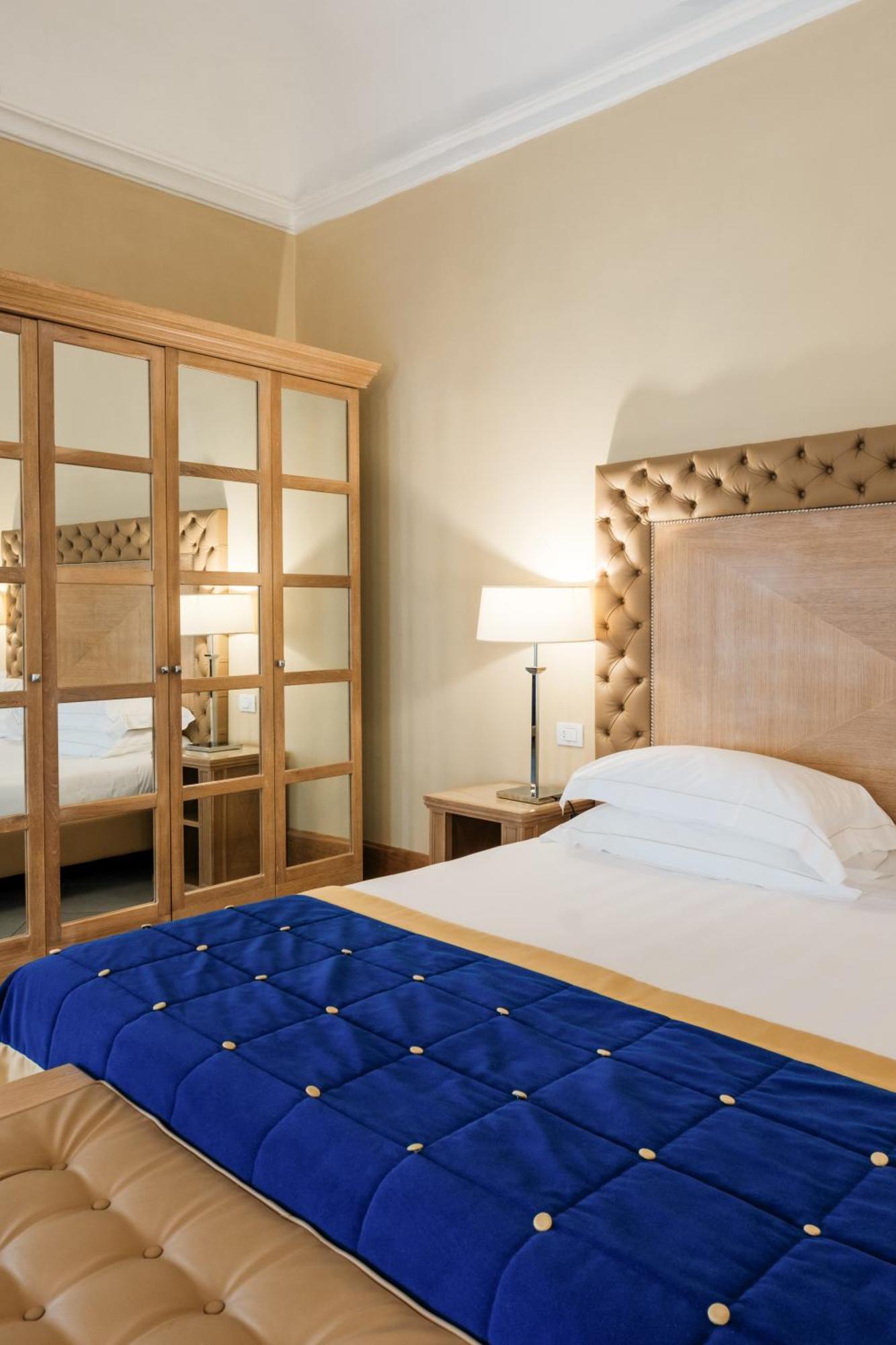 פירנצה Villa Tolomei Hotel & Resort מראה חיצוני תמונה A bedroom at the hotel