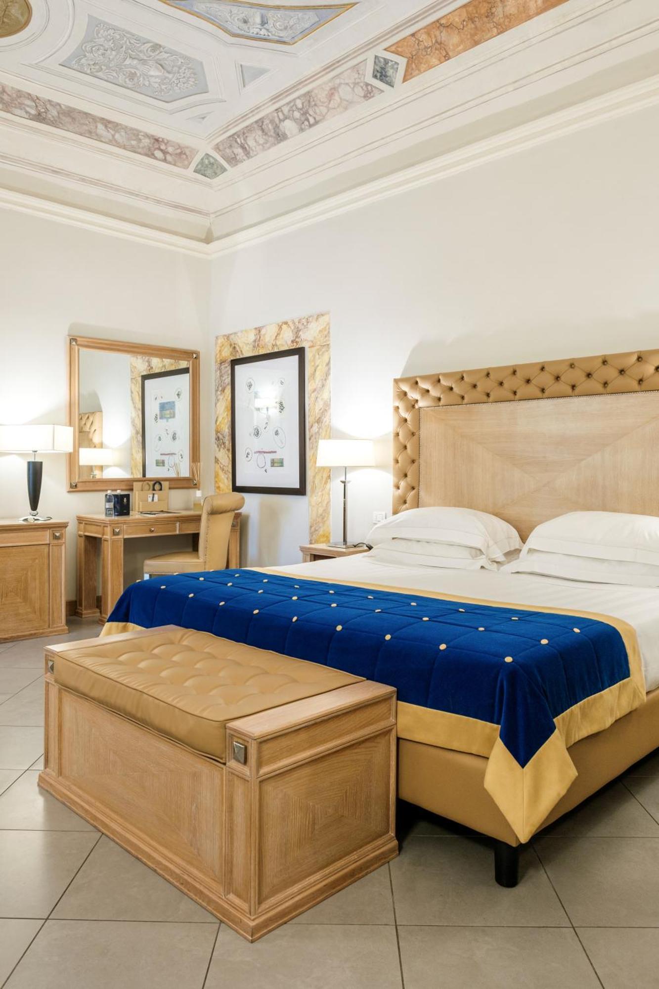 פירנצה Villa Tolomei Hotel & Resort מראה חיצוני תמונה A bedroom at the hotel