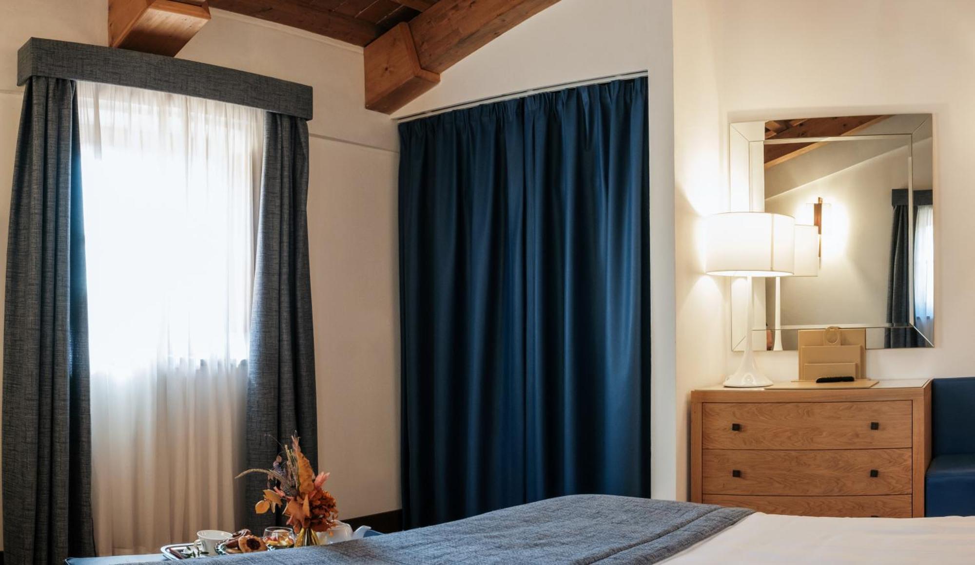 פירנצה Villa Tolomei Hotel & Resort מראה חיצוני תמונה A room divider