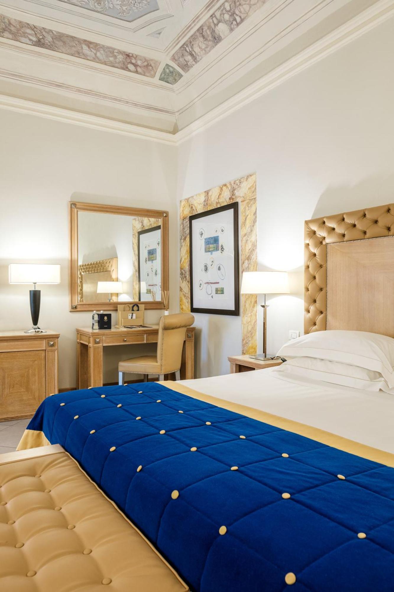 פירנצה Villa Tolomei Hotel & Resort מראה חיצוני תמונה A room at the hotel