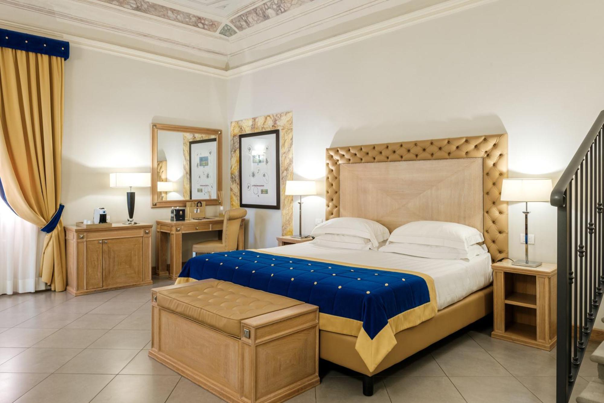 פירנצה Villa Tolomei Hotel & Resort מראה חיצוני תמונה A bedroom at the hotel