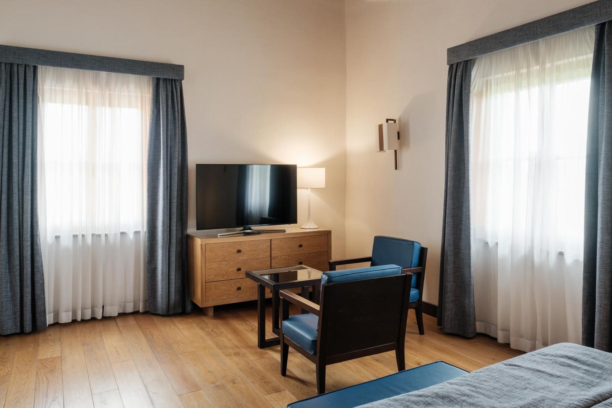 פירנצה Villa Tolomei Hotel & Resort מראה חיצוני תמונה A room at the hotel