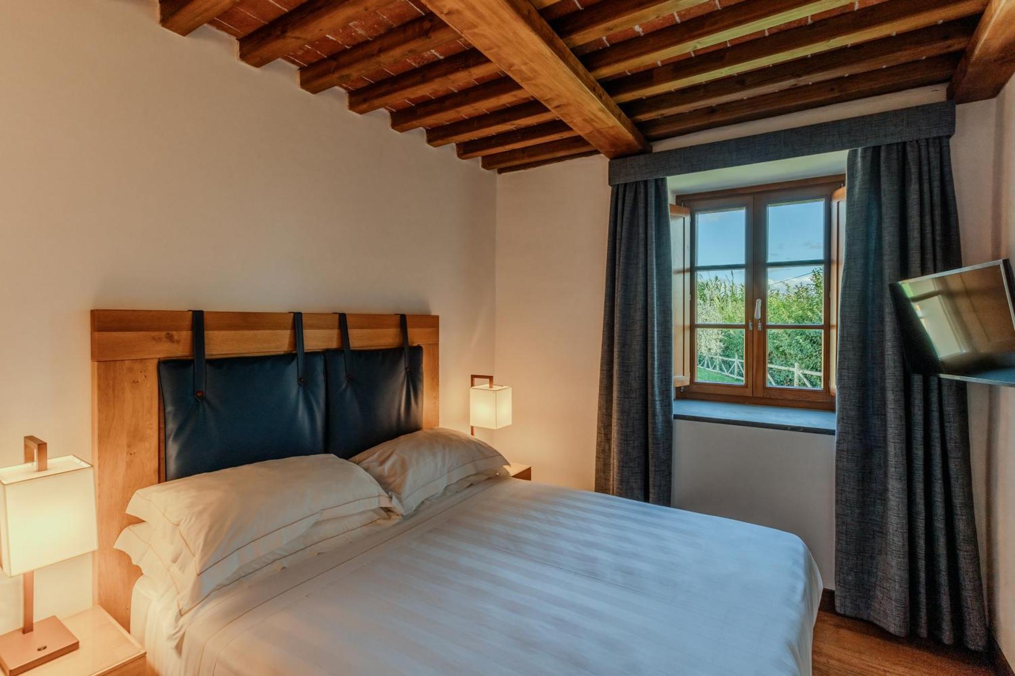 פירנצה Villa Tolomei Hotel & Resort מראה חיצוני תמונה A room at the hotel