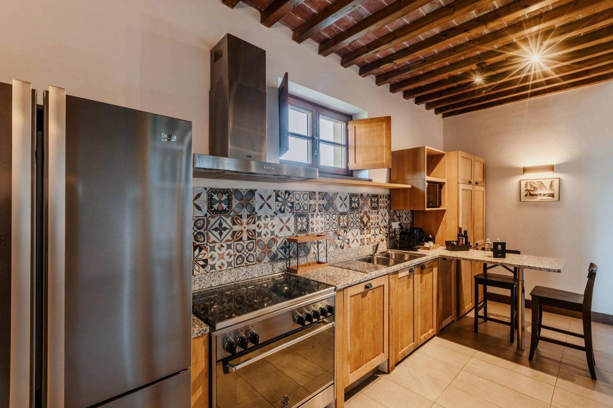 פירנצה Villa Tolomei Hotel & Resort מראה חיצוני תמונה Kitchen