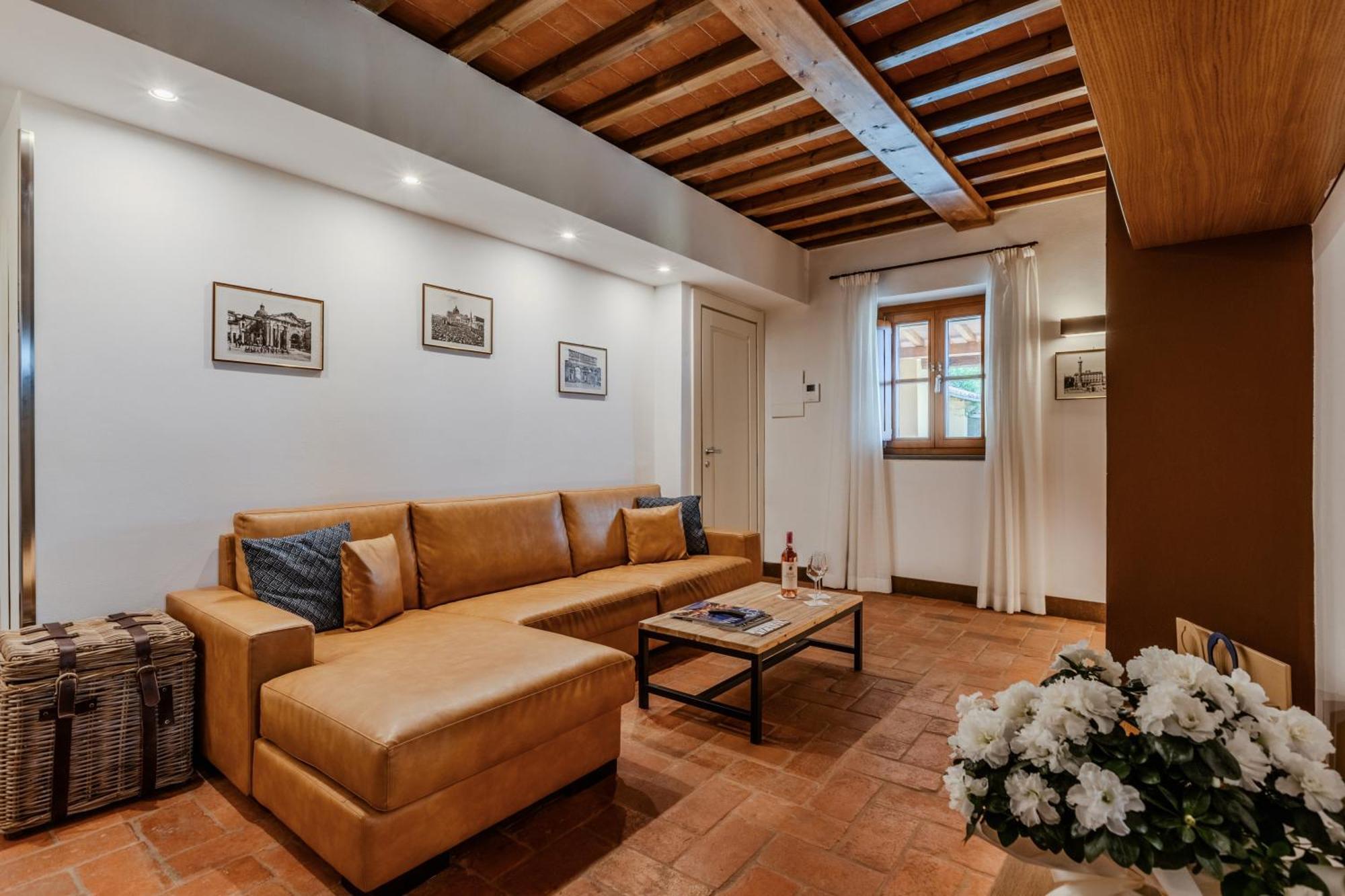 פירנצה Villa Tolomei Hotel & Resort מראה חיצוני תמונה A living room in a house