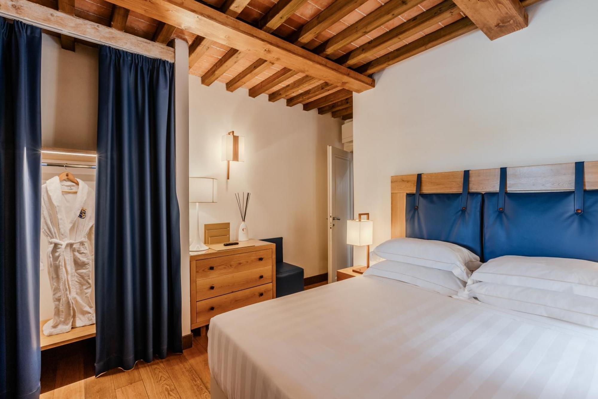 פירנצה Villa Tolomei Hotel & Resort מראה חיצוני תמונה A room at the hotel