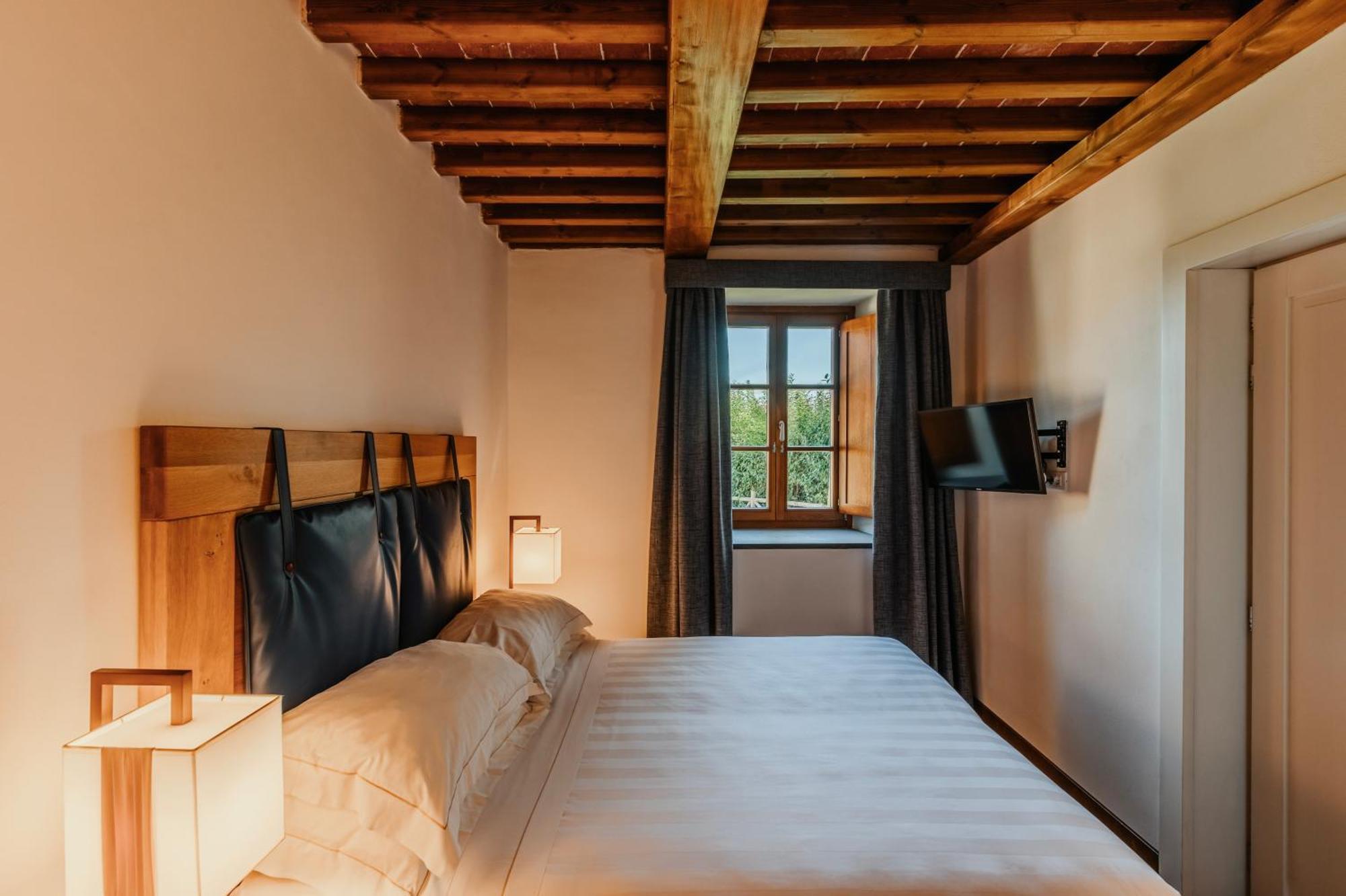 פירנצה Villa Tolomei Hotel & Resort מראה חיצוני תמונה A room at the hotel